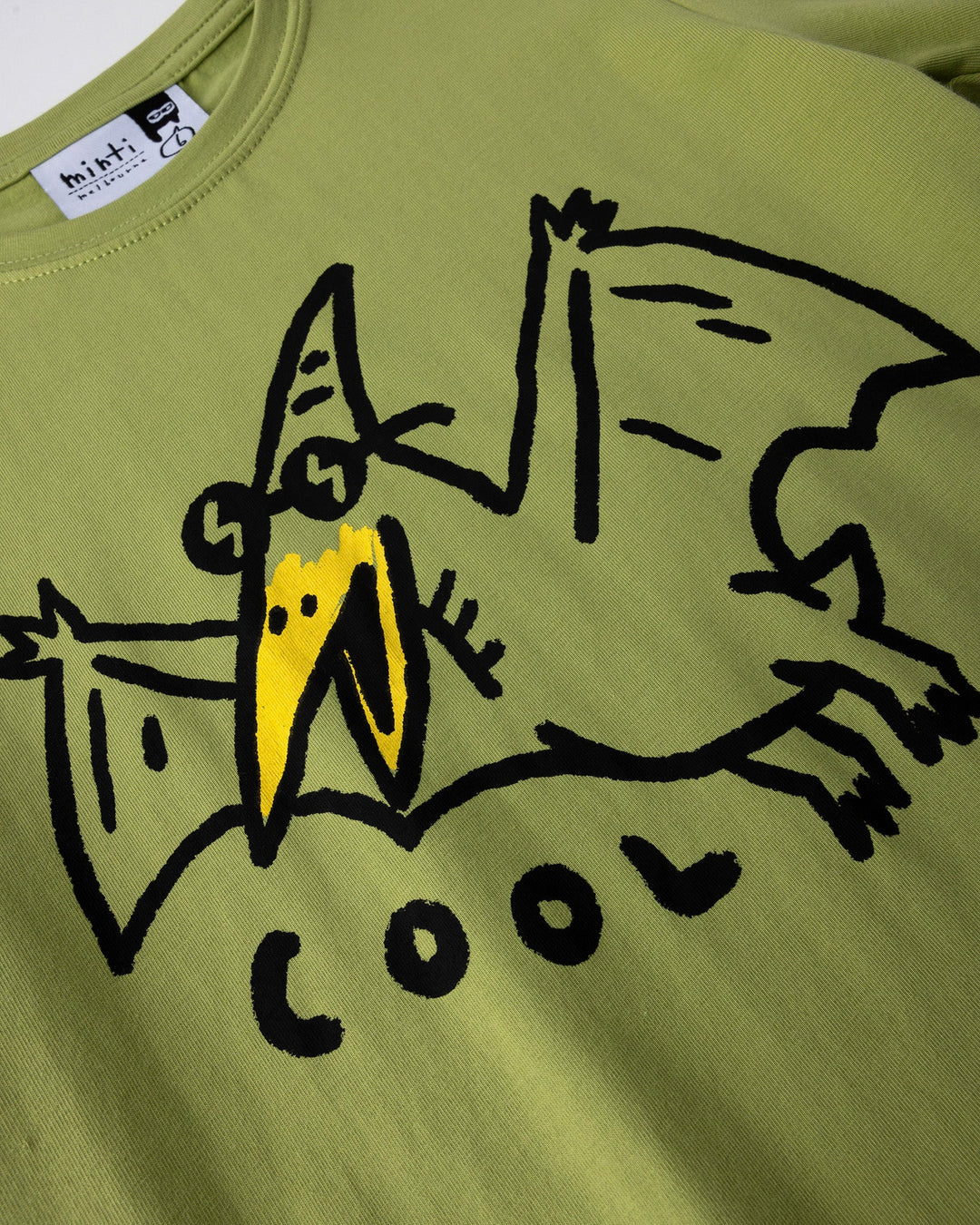Close up of the Cool Pterodactyl Tee print in lime