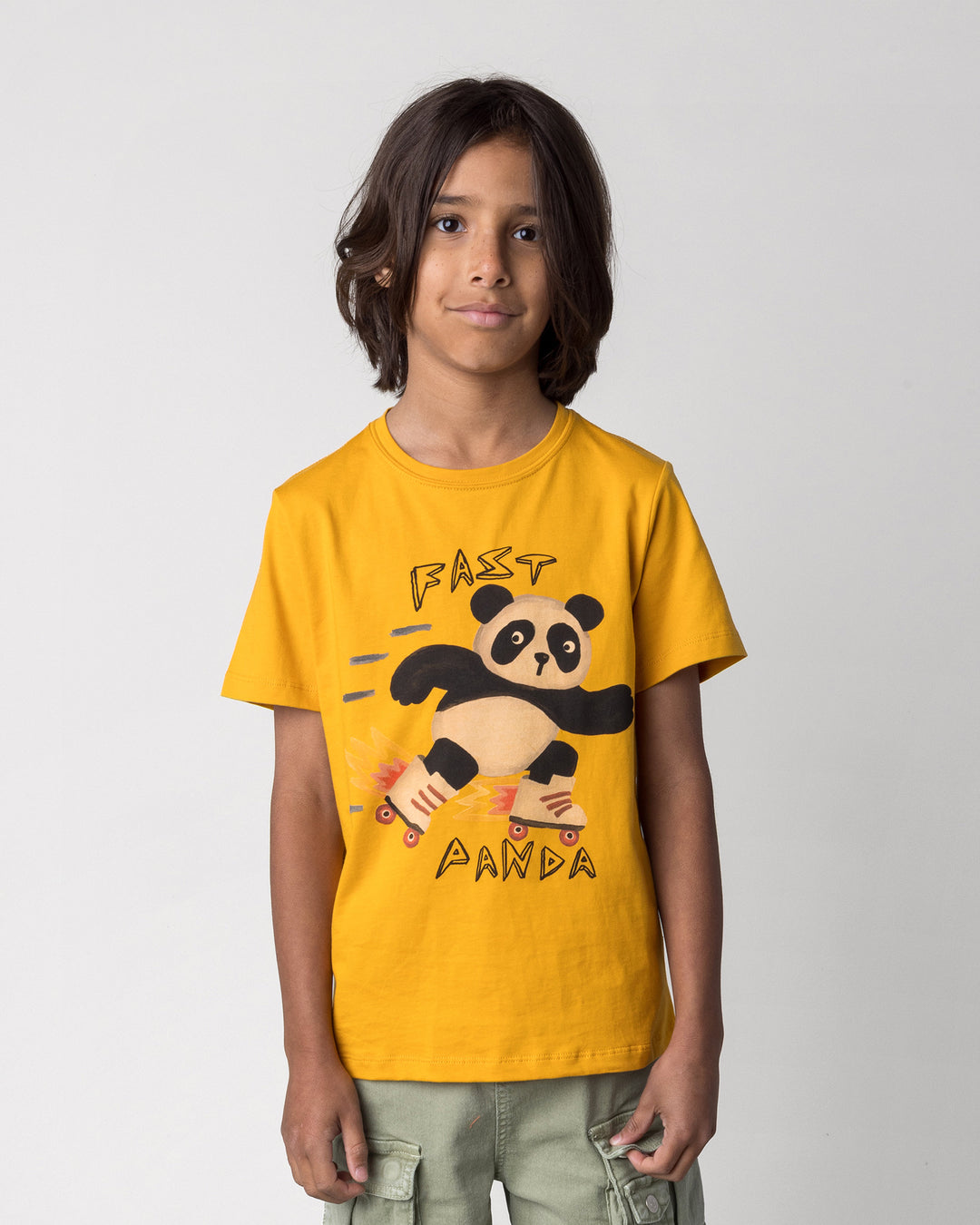 Close up of the Fast Panda Tee in mustard on a kid, front view
