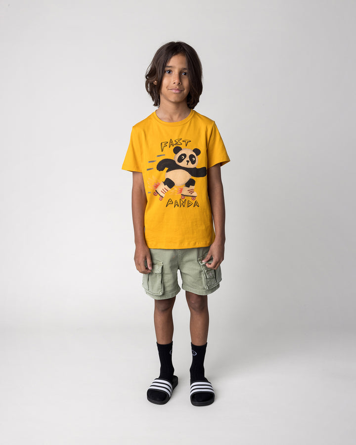 Kid wearing the Fast Panda Tee in mustard, front view
