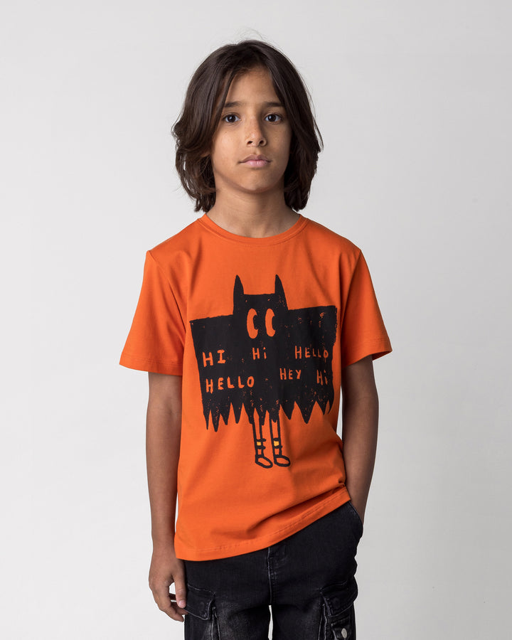 Close up of the Greetings Bat Tee in orange on a kid, front view