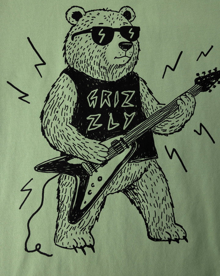 Close up of the Grizzly Tee print in sage, yellow and midnight