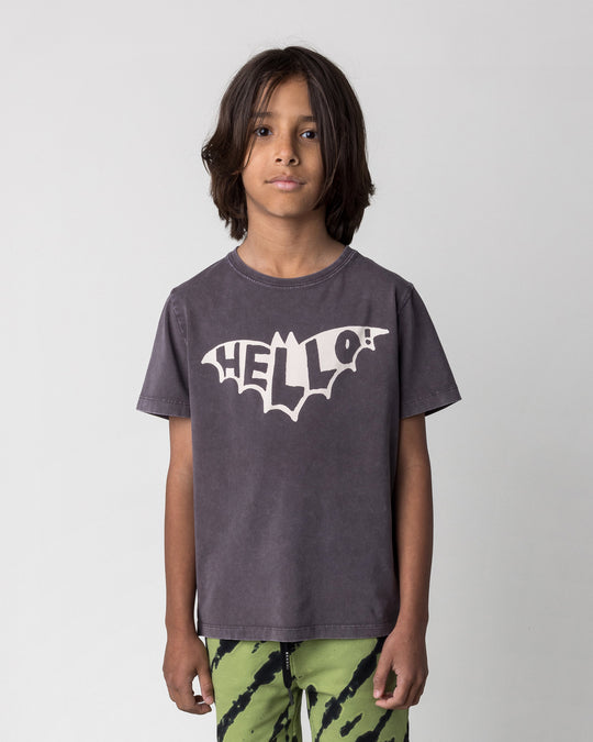 Close up of the Hello Bat Tee in black wash on a kid, front view