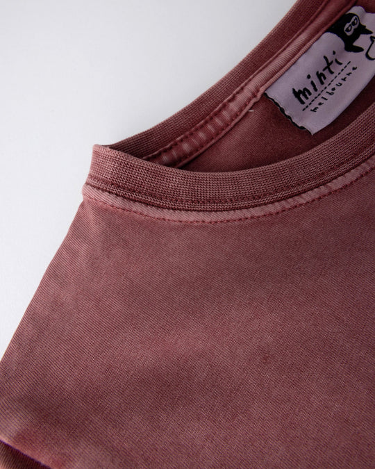 Close up detail of the Hello Bat Tee in burnt red wash
