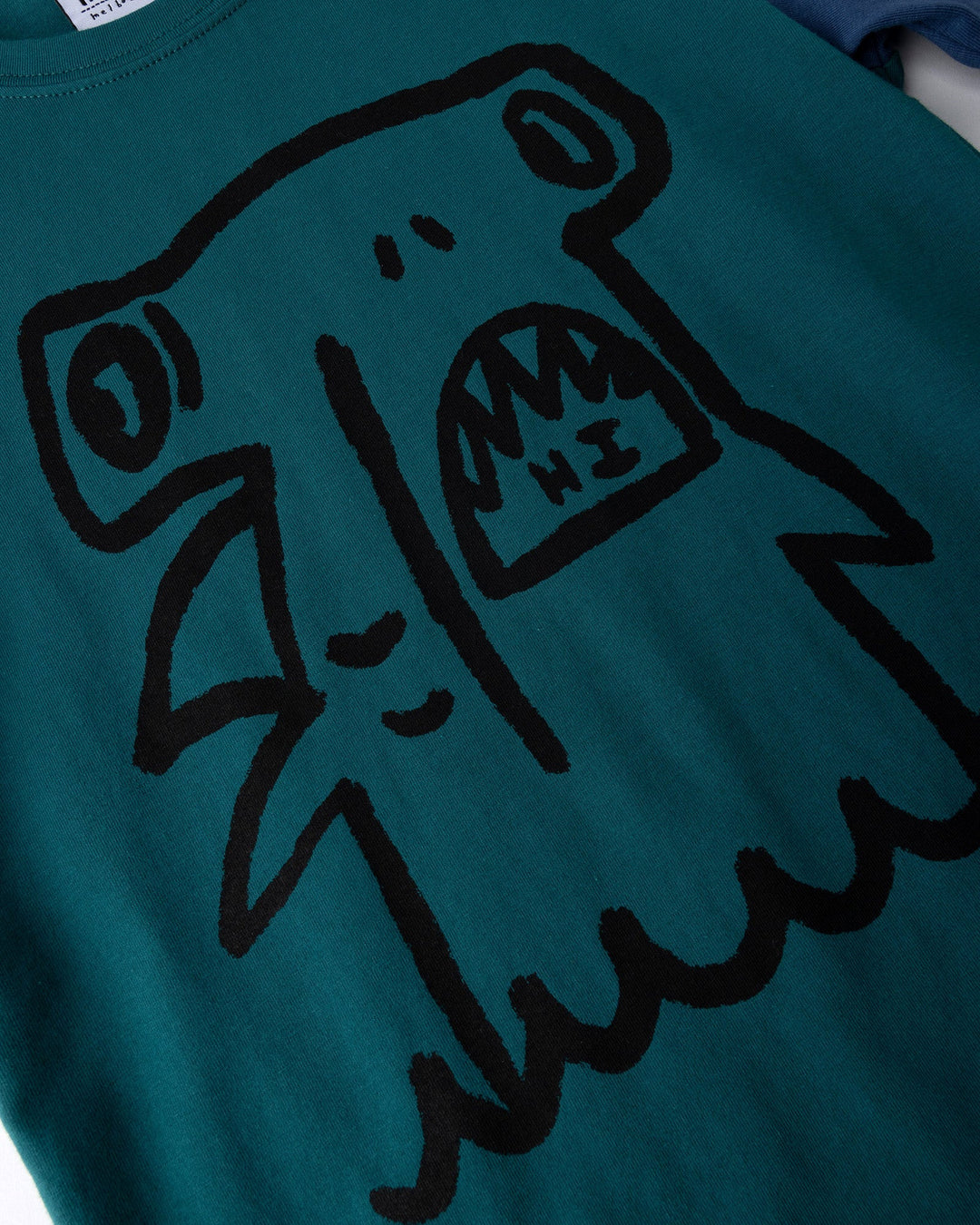 Close up of the Hi Hammerhead Tee print in dark teal and midnight