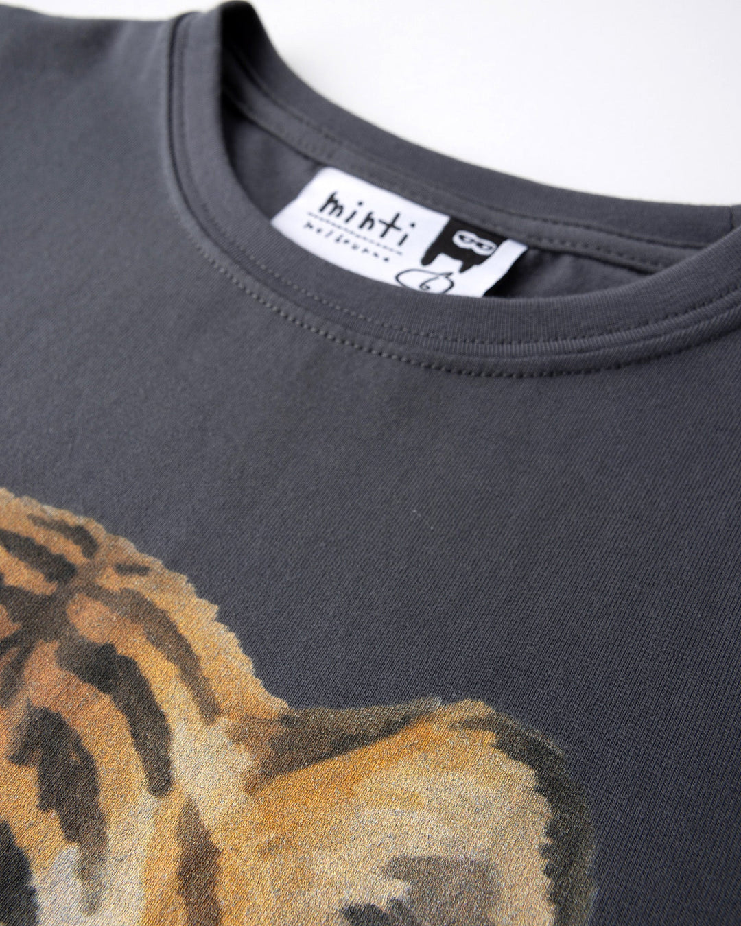 Close up detail of the Headphones Tiger Tee in dark grey