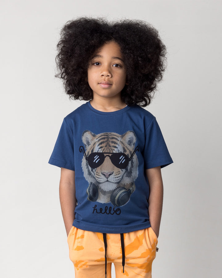 Close up of the Headphones Tiger Tee in midnight on a kid, front view