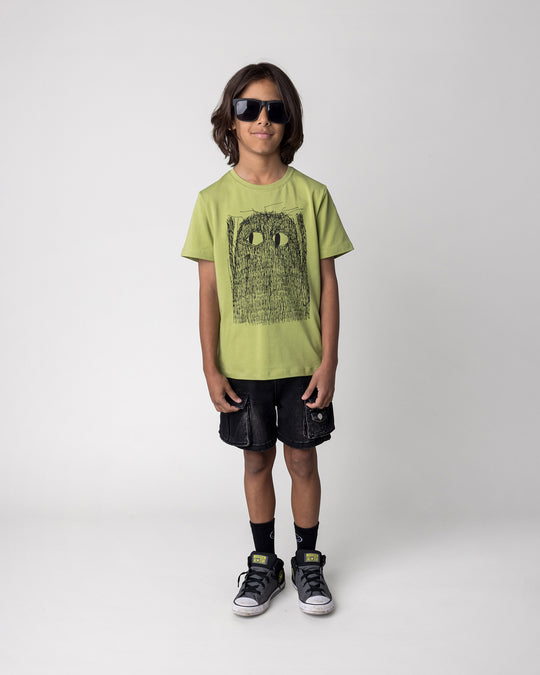 Kid wearing the Messy Monster Tee in lime, front view