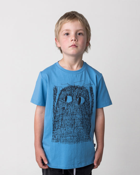 Close up of the Messy Monster Tee in steel on a kid, front view