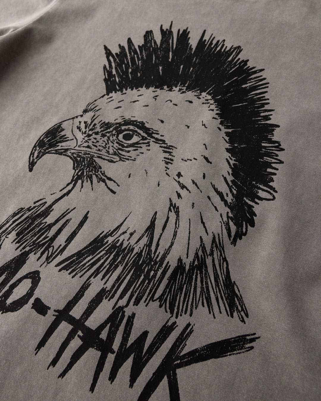 Close up of the Mo-Hawk Tee print in grey wash