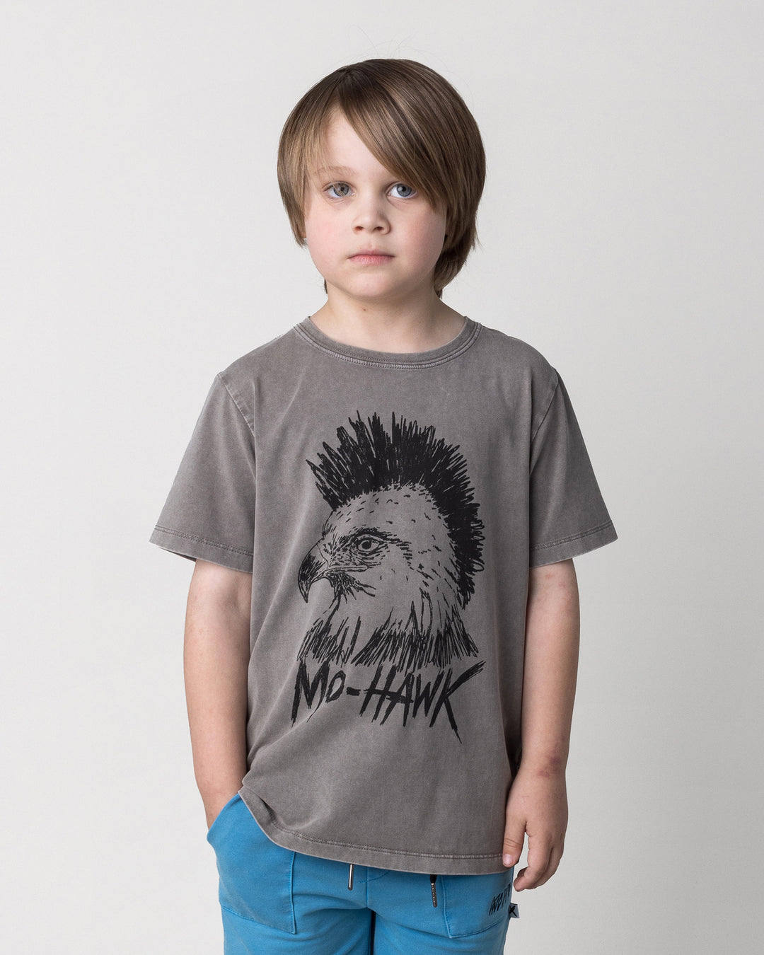Close up of the Mo-Hawk Tee in grey wash on a kid, front view
