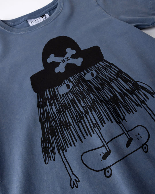 Close up of the Pirate Skater Tee print in blue wash