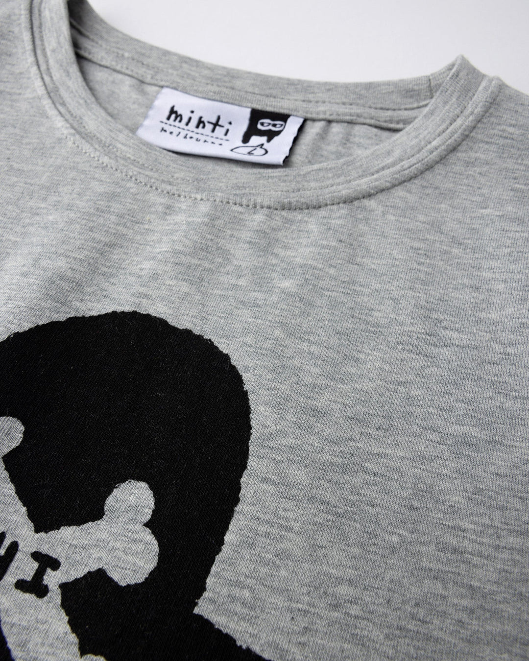 Close up detail of the Pirate Skater Tee in grey marle