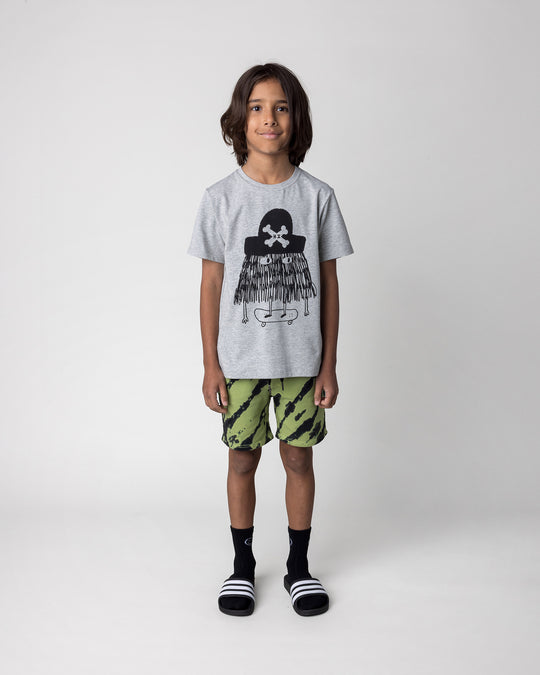 Kid wearing the Pirate Skater Tee in grey marle with the Strike Short in lime, front view