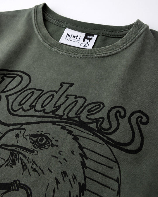 Close up of the Radness Tee print in olive wash