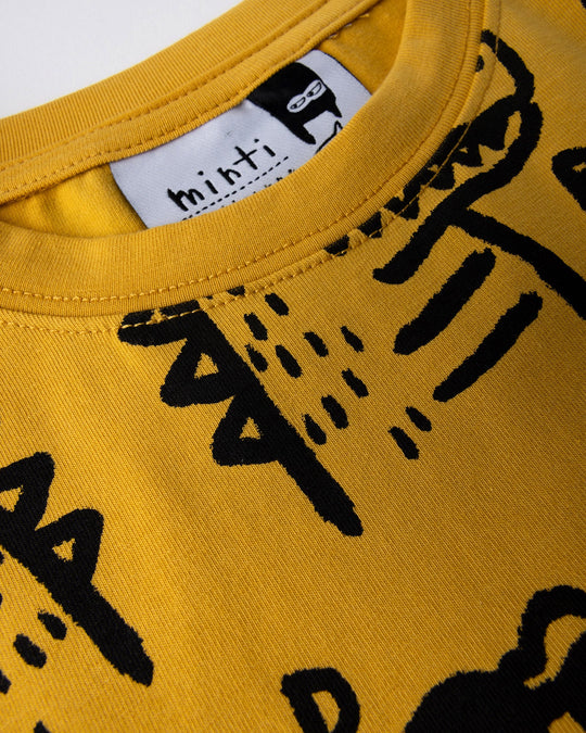 Close up detail of the Rad Croc Tee in mustard