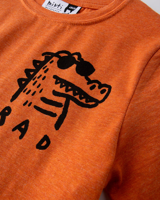 Close up of the Rad Croc Tee print in orange marle