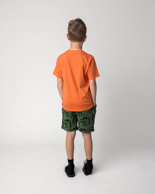 Kid wearing the Rad Croc Tee in orange marle with the Rad Croc Short in green, back view
