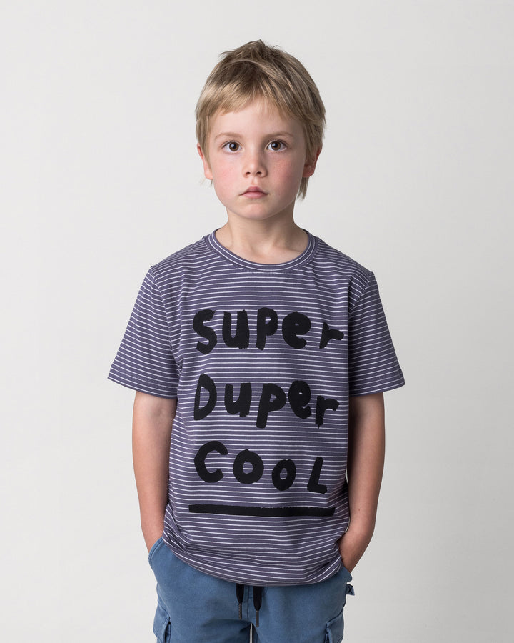 Close up of the Super Duper Cool Tee in storm stripe on a kid, front view