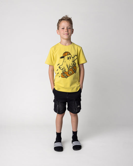Kid wearing the Skate Ghost Tee in zest, front view