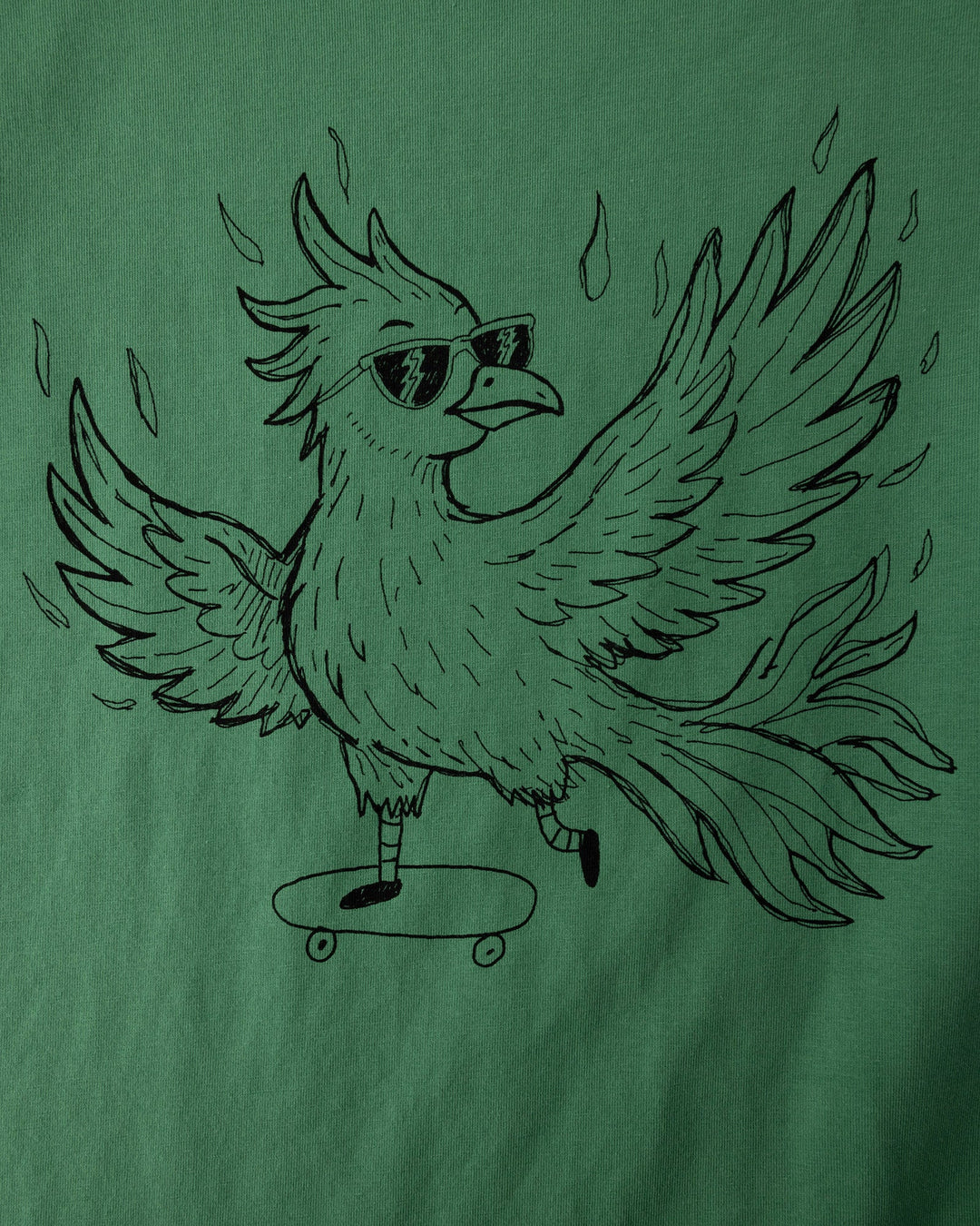 Close up of the Skate Phoenix Tee print in turf
