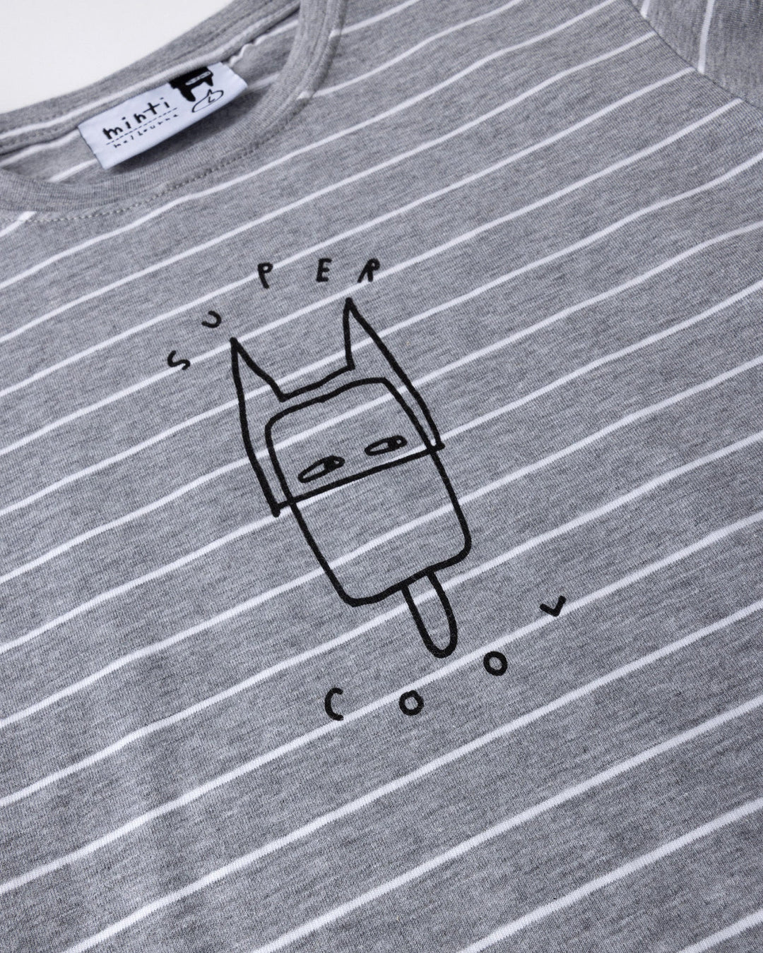 Close up of the Super Cool Tee print in grey stripe