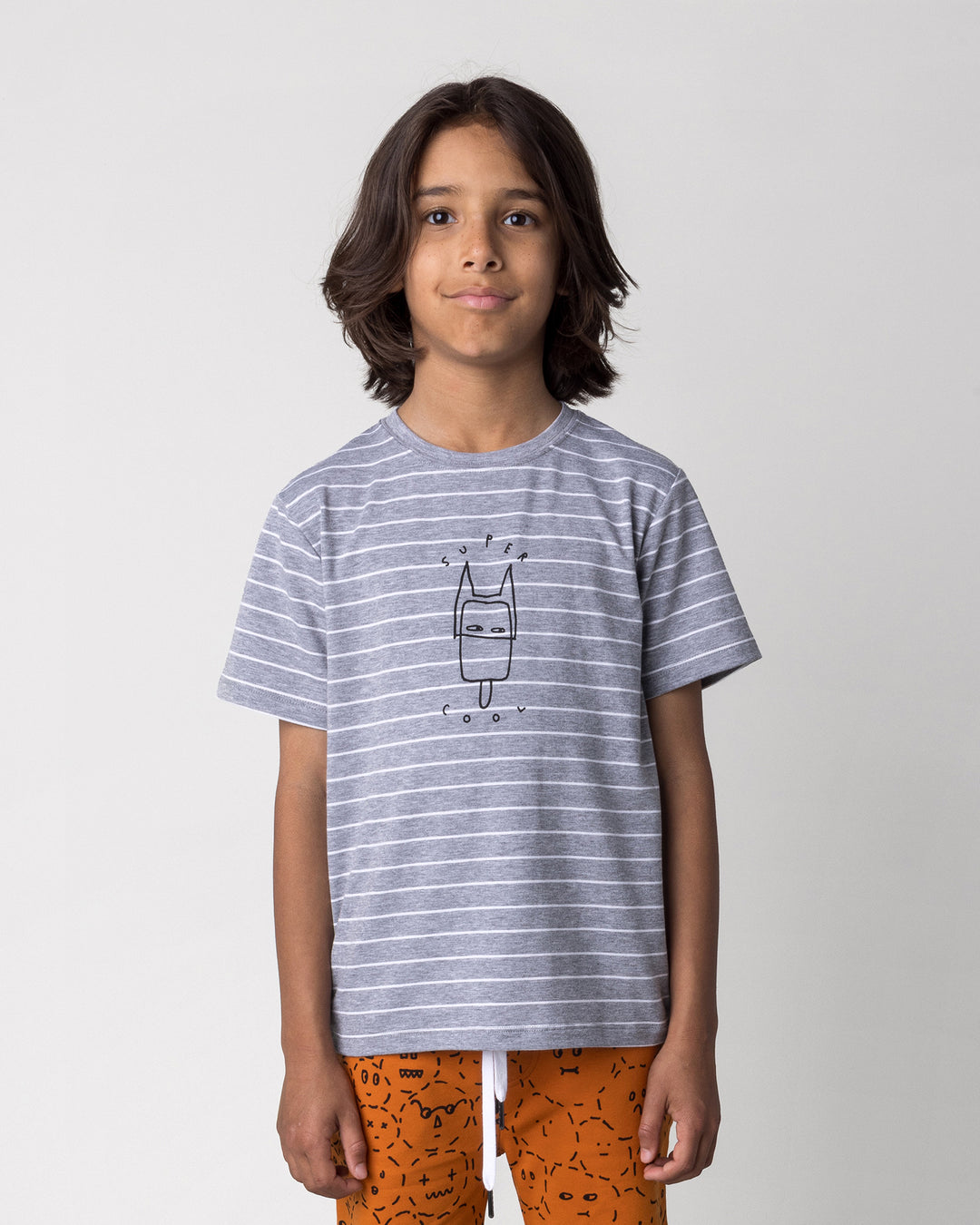 Close up of the Super Cool Tee in grey stripe on a kid, front view