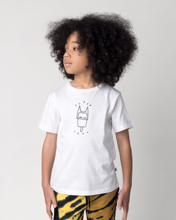 Close up of the Super Cool Tee in off white on a kid, front view