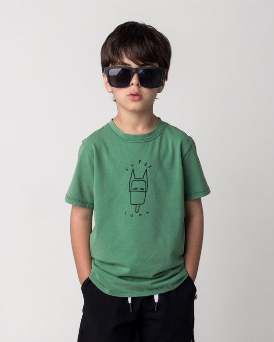 Close up of the Super Cool Tee in turf wash on a kid, front view