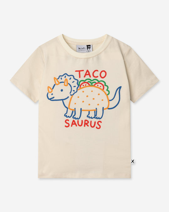 Taco Saurus Tee in cream, boys t shirt by Minti, flat lay
