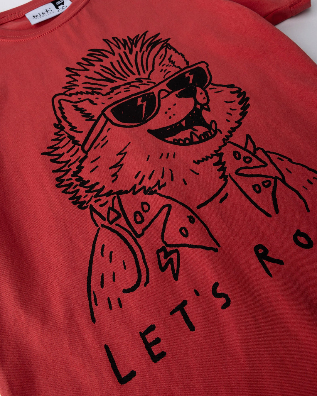 Close up of the Werewolf Rockstar Tee print in melon