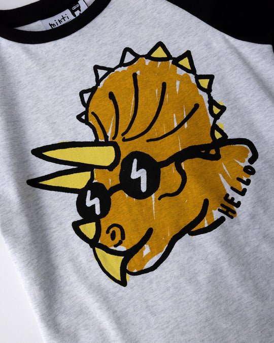 Close up of the Cool Dino Tee print in white marle and black