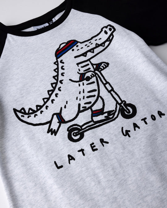Close up of the Later Gator Tee print in white marle and black