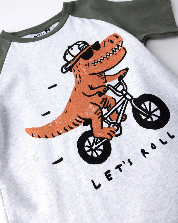 Close up of the Rex Rider Tee print in white marle and forest