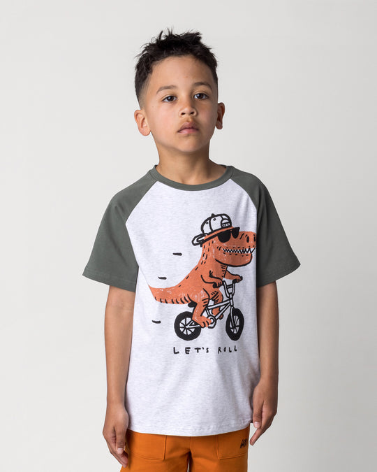 Close up of the Rex Rider Tee in white marle and forest on a kid, front view