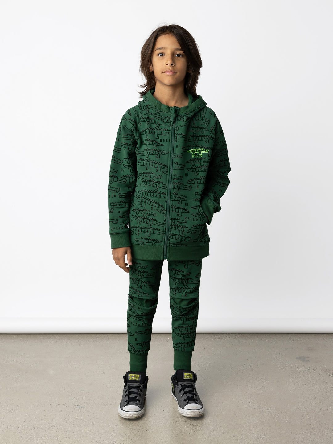 Minti kids clothing. Cosy zip through hoodie with kangaroo pockets for extra warmth! 2x2 rib trim on the hood, cuffs and hem. Small Hello Croc embroidery on the front. 330 Gram // Brushed Inside // 95% Cotton // 5% Elastane.