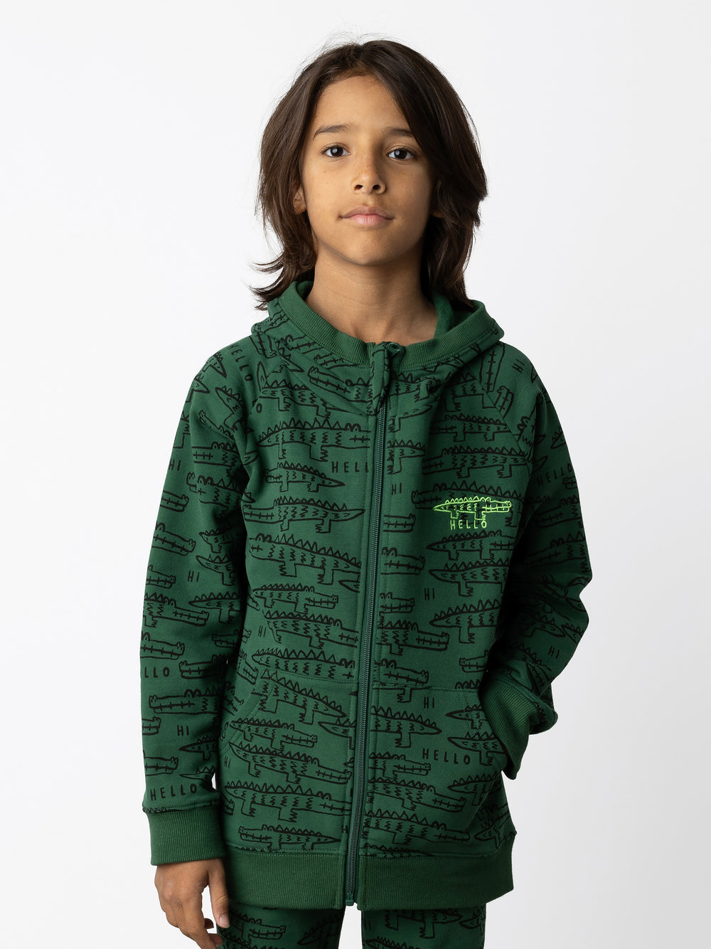 Minti kids clothing. Cosy zip through hoodie with kangaroo pockets for extra warmth! 2x2 rib trim on the hood, cuffs and hem. Small Hello Croc embroidery on the front. 330 Gram // Brushed Inside // 95% Cotton // 5% Elastane.