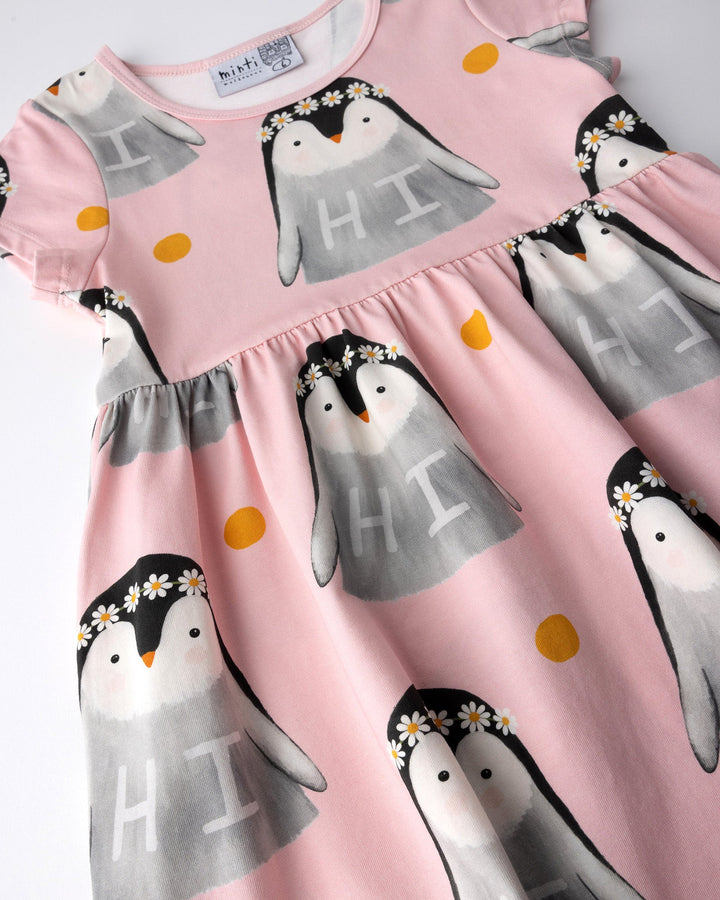 Close up of the Flower Penguin Dress print in pink