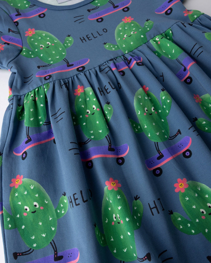 Close up of the Skate Cactus Dress print in muted blue