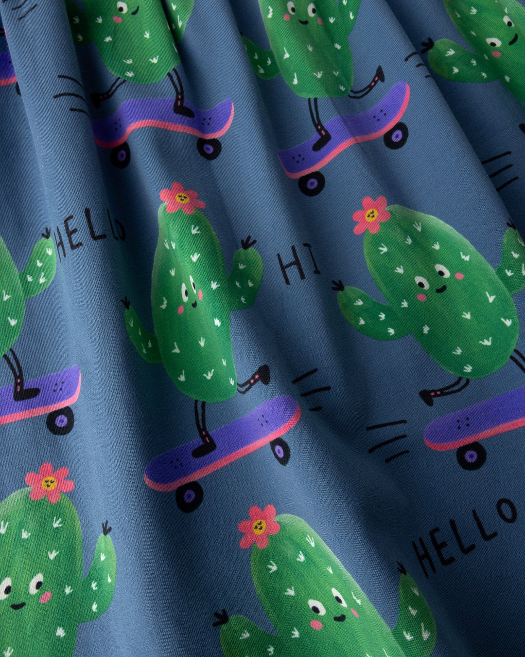 Close up of the Skate Cactus Dress print in muted blue