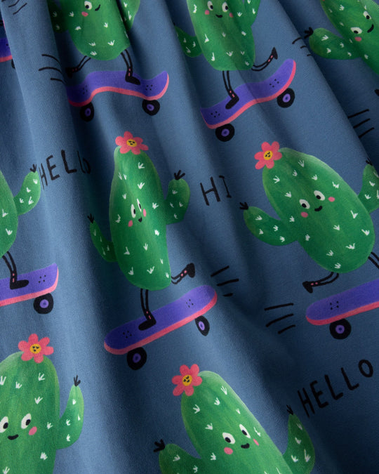 Close up of the Skate Cactus Dress print in muted blue
