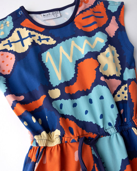 Close up of the Cool Shapes Playsuit print in dark blue