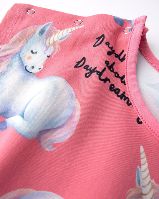 Close up of the Daydreaming Unicorn Playsuit print in candy