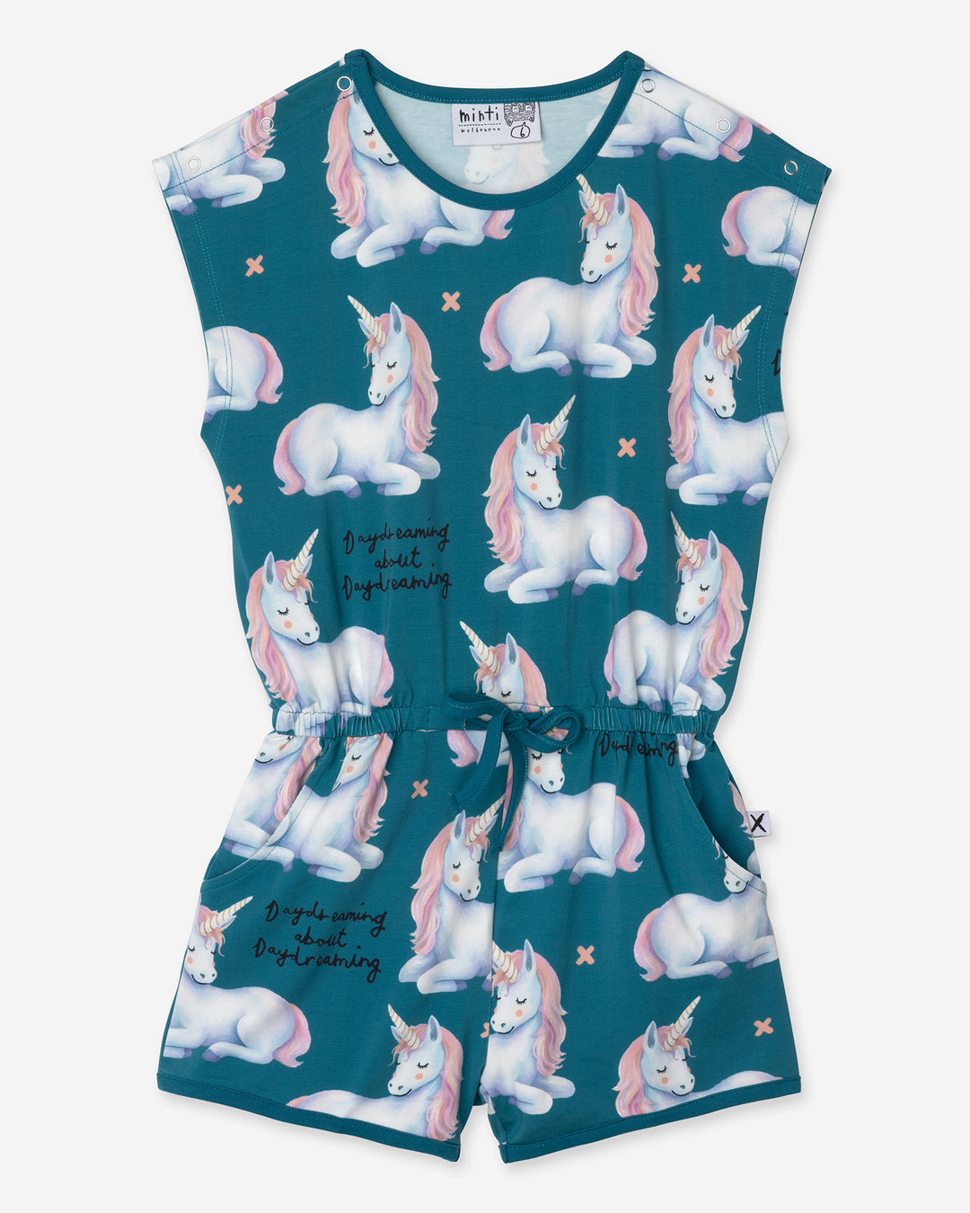 Daydreaming Unicorn Playsuit in teal, girls playsuit by Minti, flat lay
