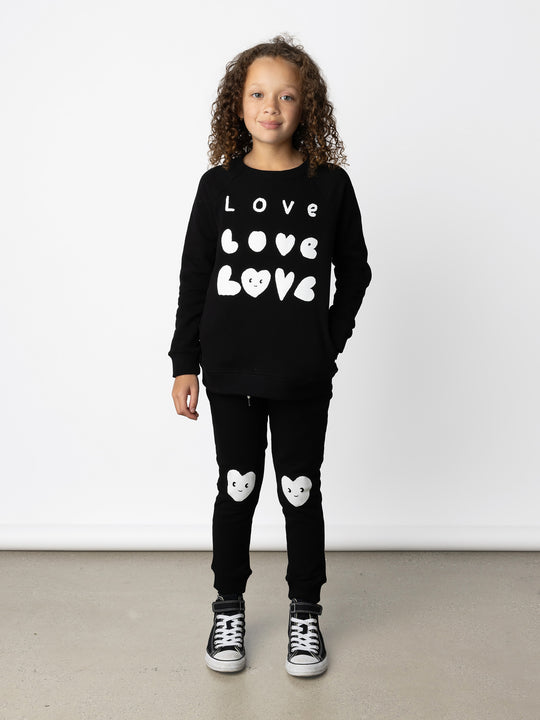 Minti kids clothing. Super comfy crew with rounded side pockets. 330 Gram // Brushed Inside // 95% Cotton // 5% Elastane.