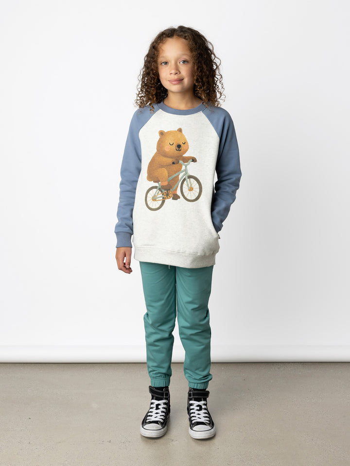 Minti kids clothing. Super comfy crew with rounded side pockets. 330 Gram // Brushed Inside // 95% Cotton // 5% Elastane.