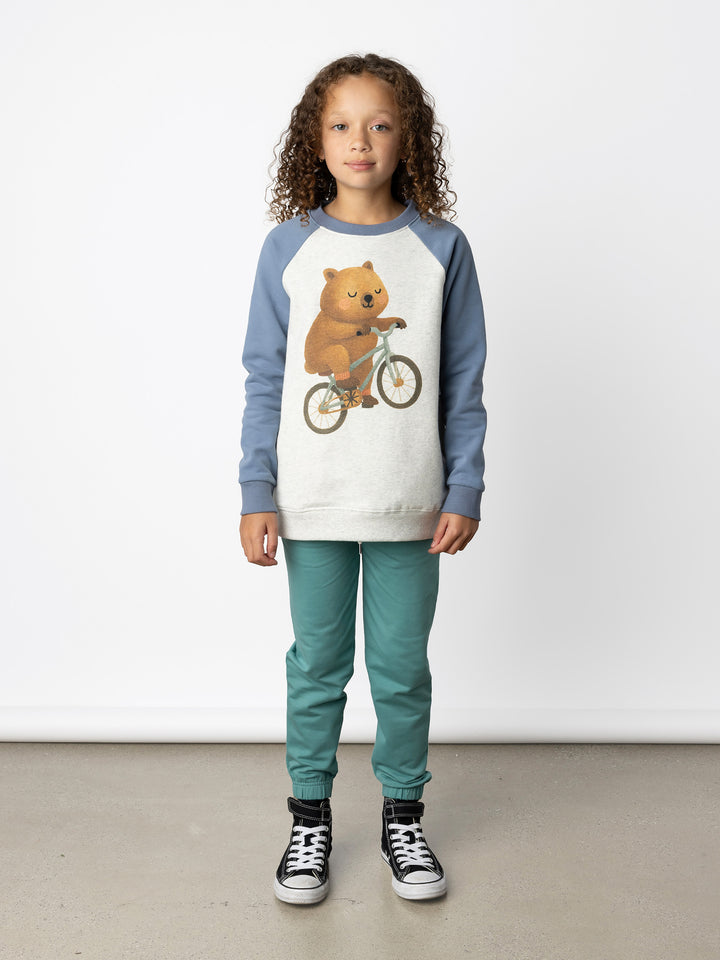 Minti kids clothing. Super comfy crew with rounded side pockets. 330 Gram // Brushed Inside // 95% Cotton // 5% Elastane.