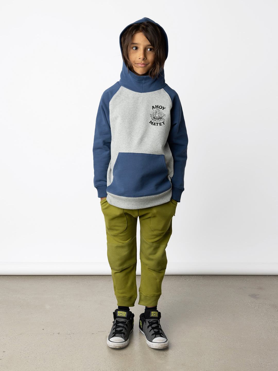 Minti kids clothing. Very comfy hoodie with contrast raglan sleeves and contrast front kangaroo pocket. Small print on the front. 330 Gram // Brushed Inside // 95% Cotton // 5% Elastane.