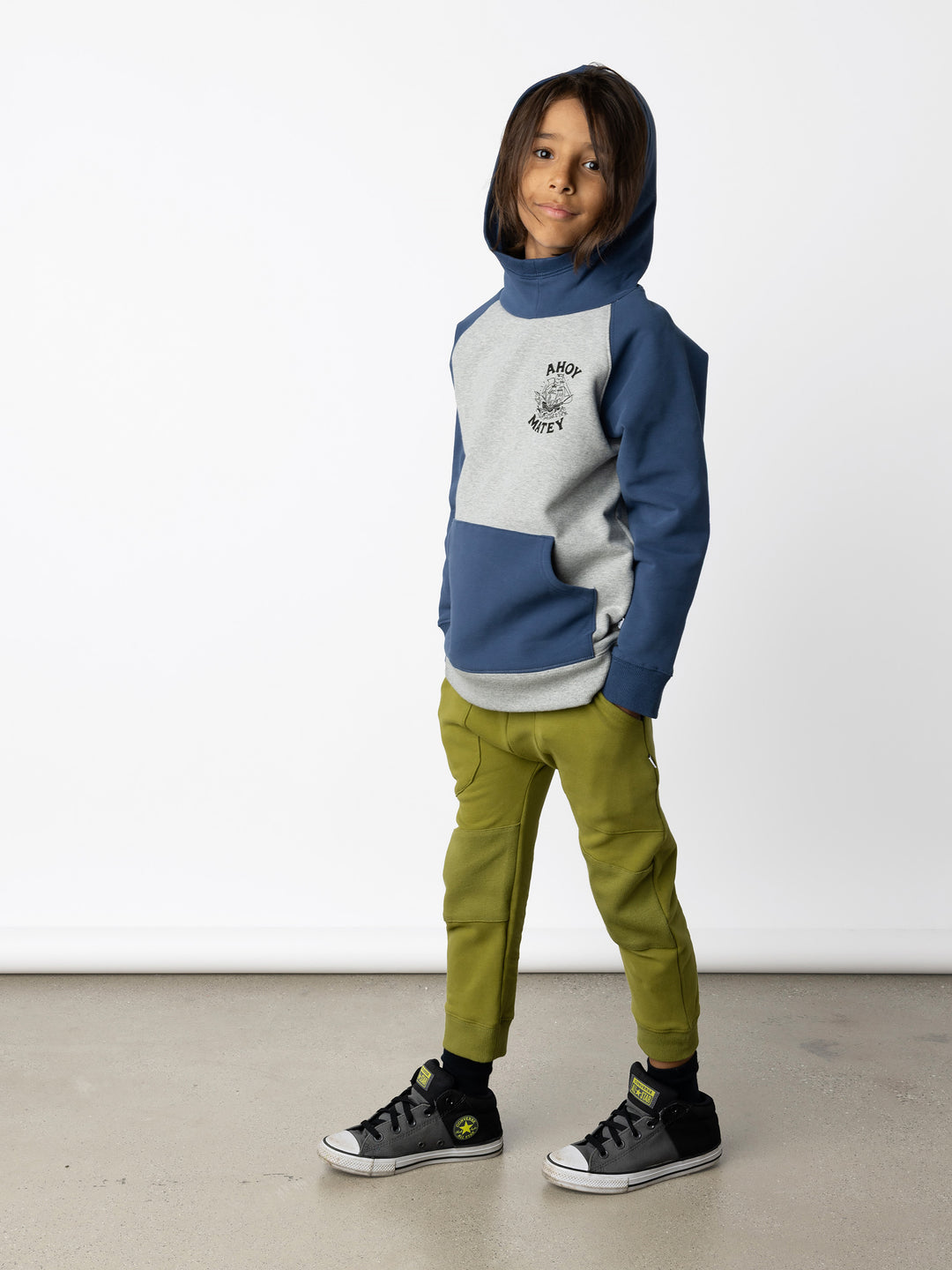 Minti kids clothing. Very comfy hoodie with contrast raglan sleeves and contrast front kangaroo pocket. Small print on the front. 330 Gram // Brushed Inside // 95% Cotton // 5% Elastane.