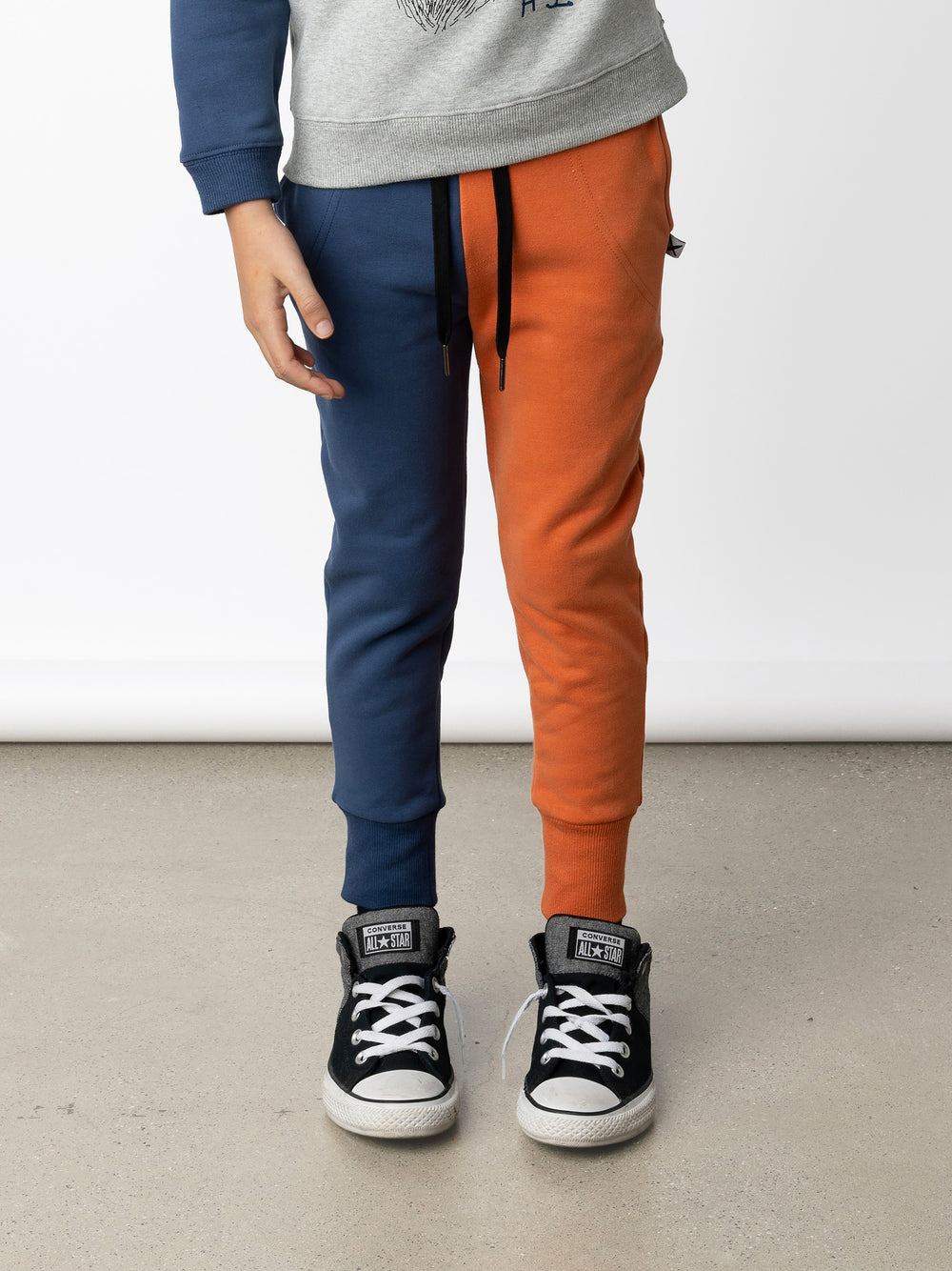Minti kids clothing. Straight leg trackies with stitched detail pockets, elasticated waistband, shoelace ties and back pocket. Small Minti embroidery on the back pocket. 330 Gram // Brushed Inside // 95% Cotton // 5% Elastane.