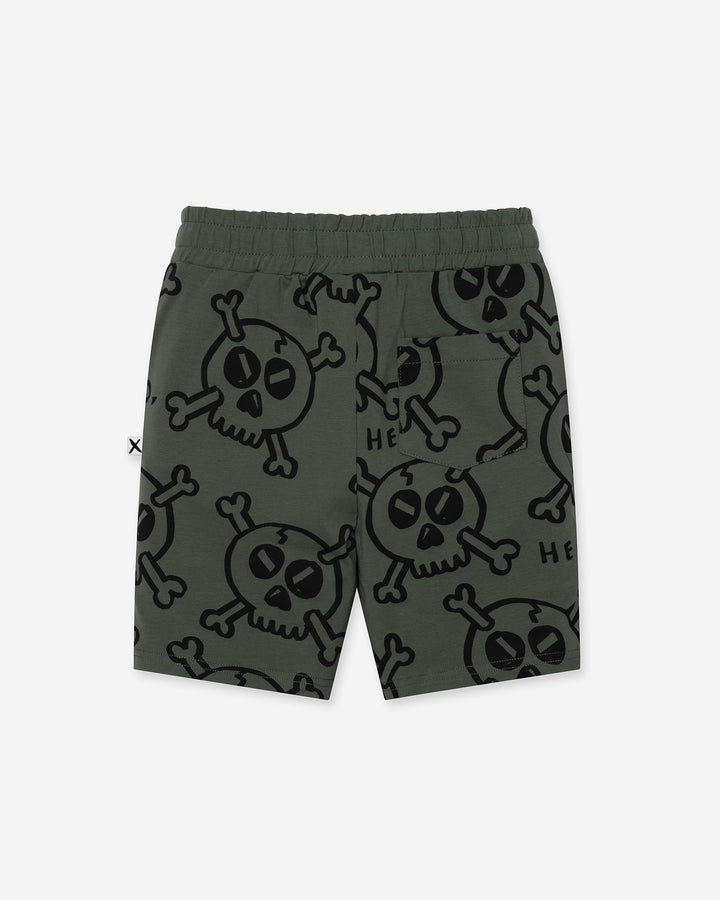 Hello Skull Short in forest, boys shorts by Minti, flat lay, back view